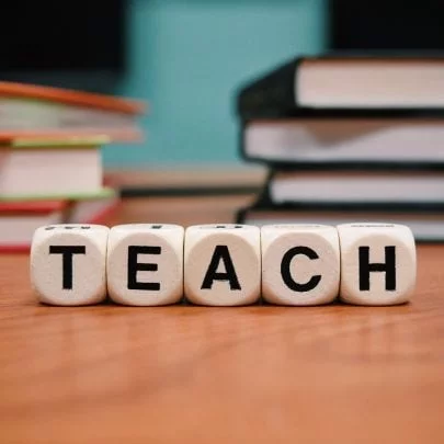 Teach written on dice